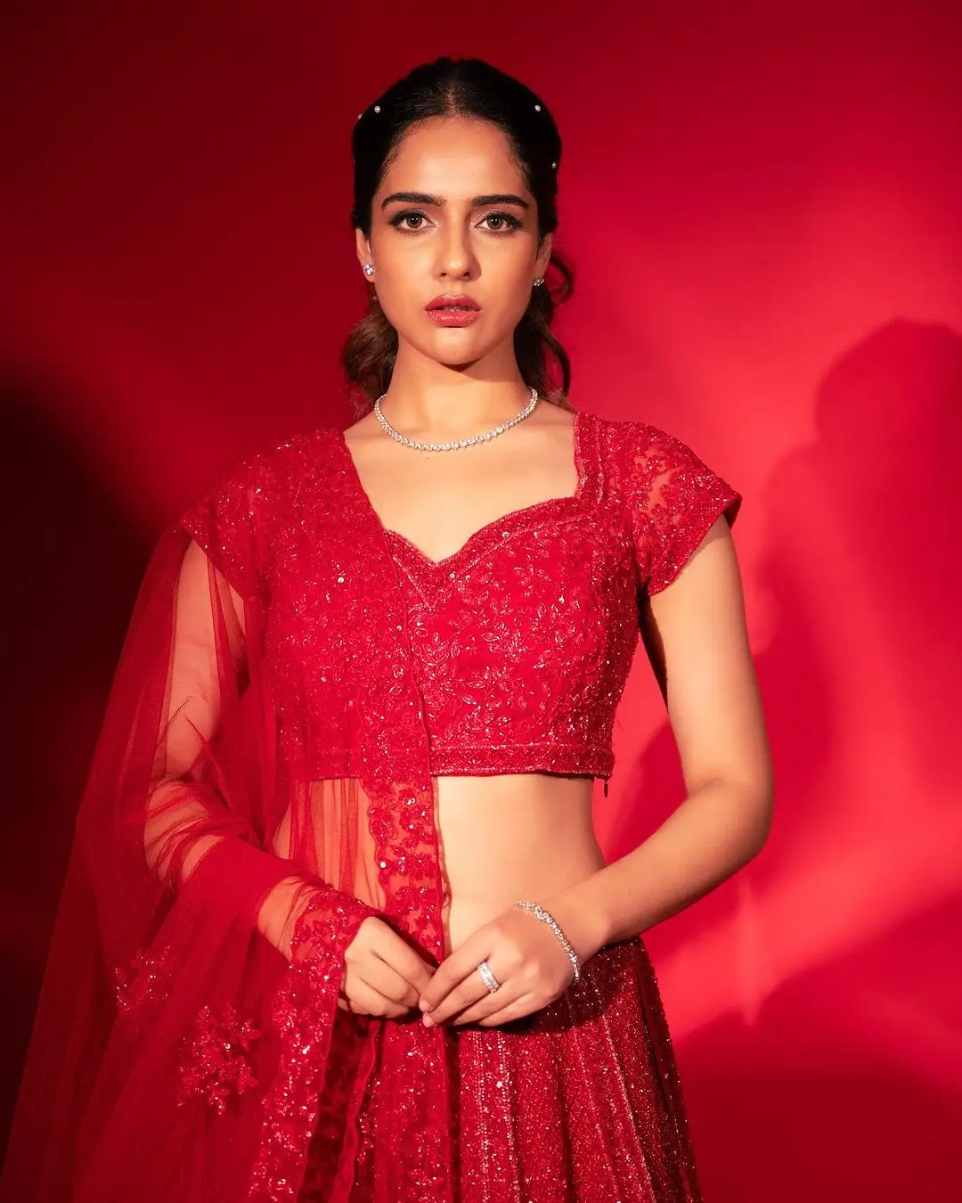 Malvi Malhotra Stills in Red Lehenga Choli Voni